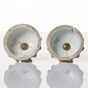 A pair of French 'Sèvres' porcelain urns, 1890s.