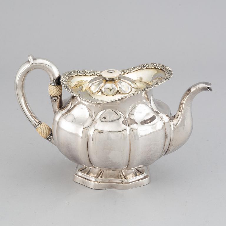 A Russian 19th century parcel-gilt silver tea-pot, mark of Adolf Sper, St. Petersburg 1837.