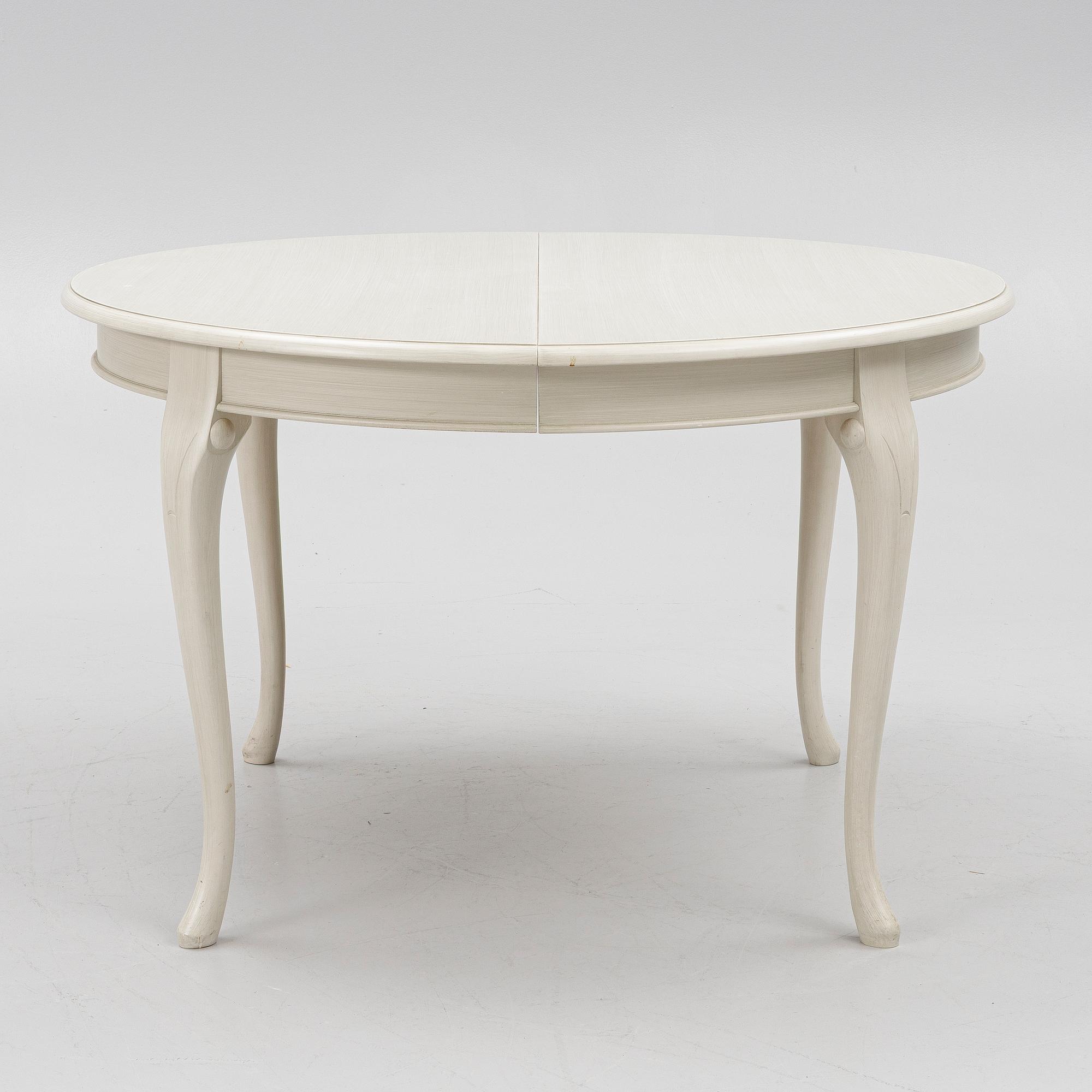 A Rococo style dining table and twelve chairs, KA Roos, Helsingborg, modern production.