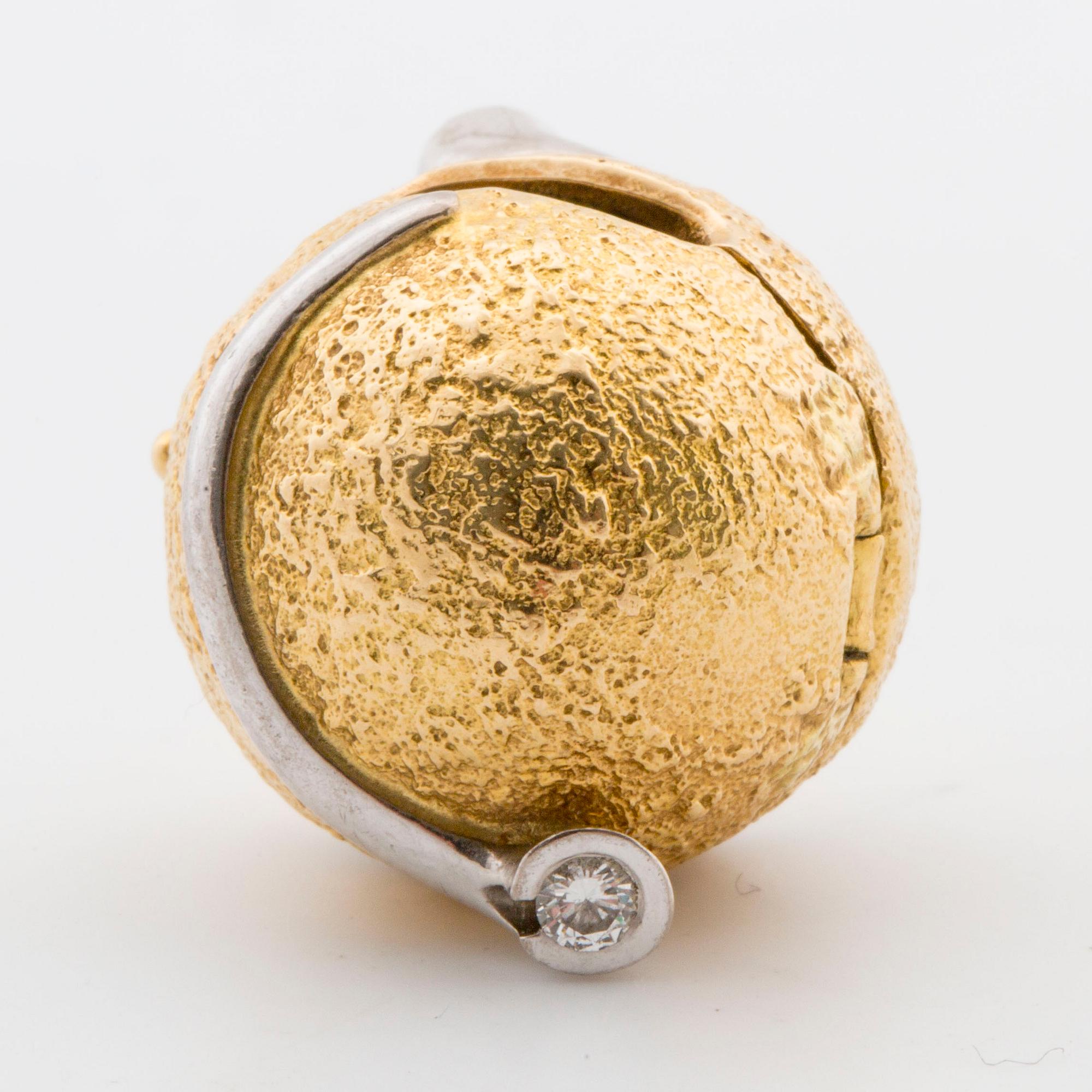 OLE LYNGGAARD, A 18K gold lock with small diamonds,.
