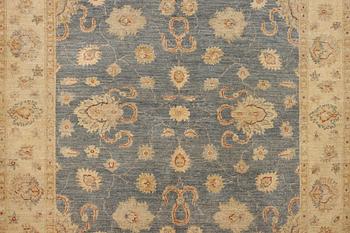 An Ushak rug, c. 242 x 165 cm.