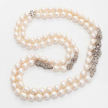 Pearl necklace, sterling silver, freshwater pearls and diamonds.