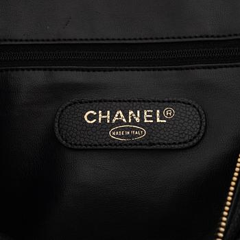 Chanel, a black caviar leather 'Boston bag'.