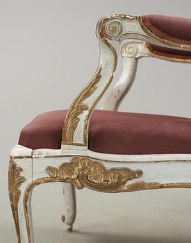 A pair of Rococo 18th century armchairs.