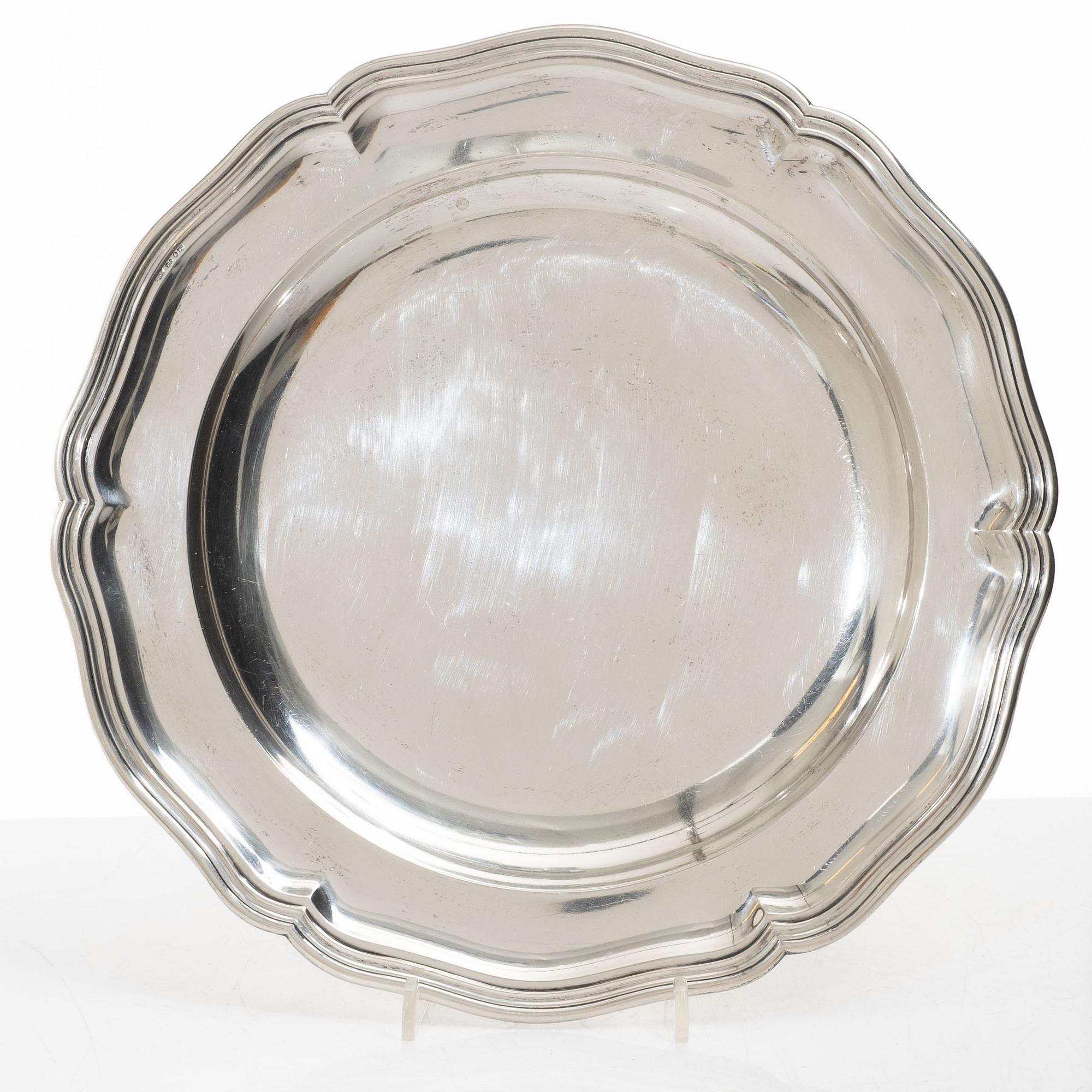 A set of seven silver plates (6+1), including GAB, Stockholm 1943.