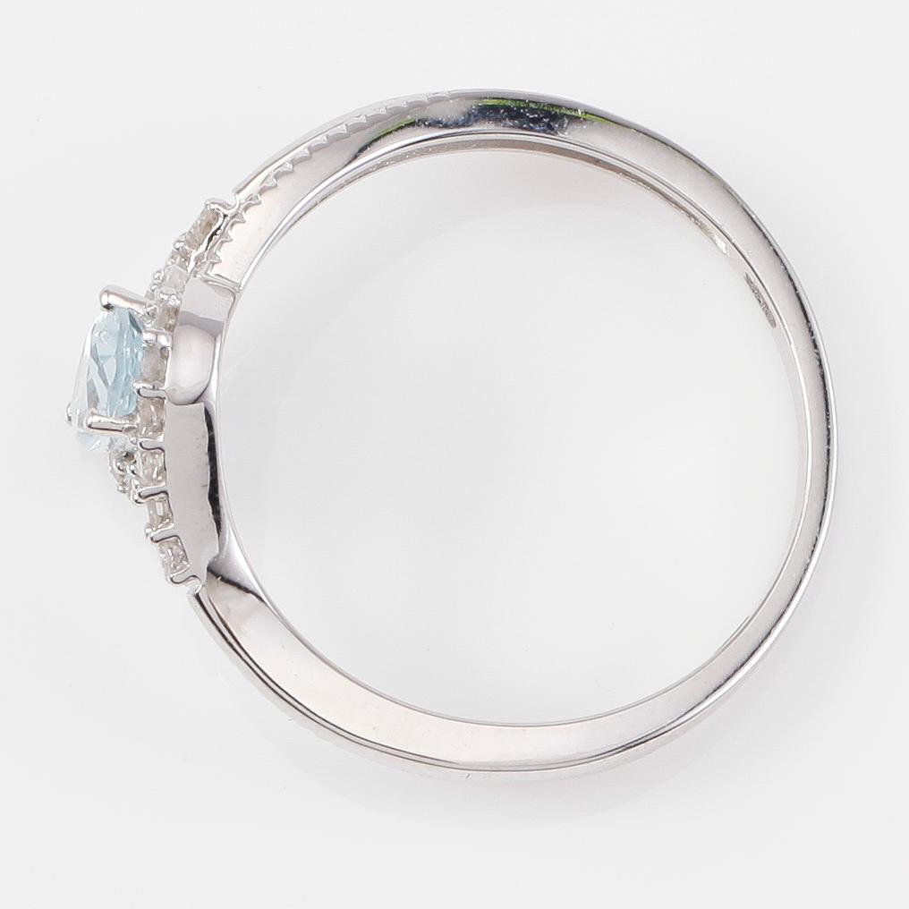 RING, 14K vitguld, diamanter tot ca 0.17 ct. och akvamarin tot ca 0.50 ct.