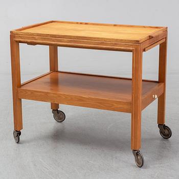 A 1930s/1940s elm veneered trolley.