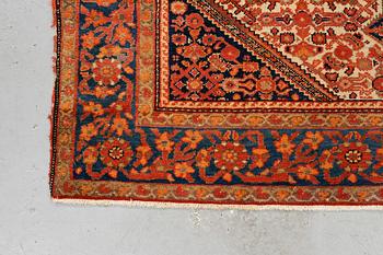 A rug, antique Malayer, ca 201,5 x 131,5 cm.