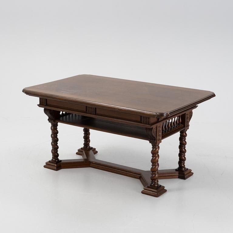 A writing desk / library table, circa 1900.