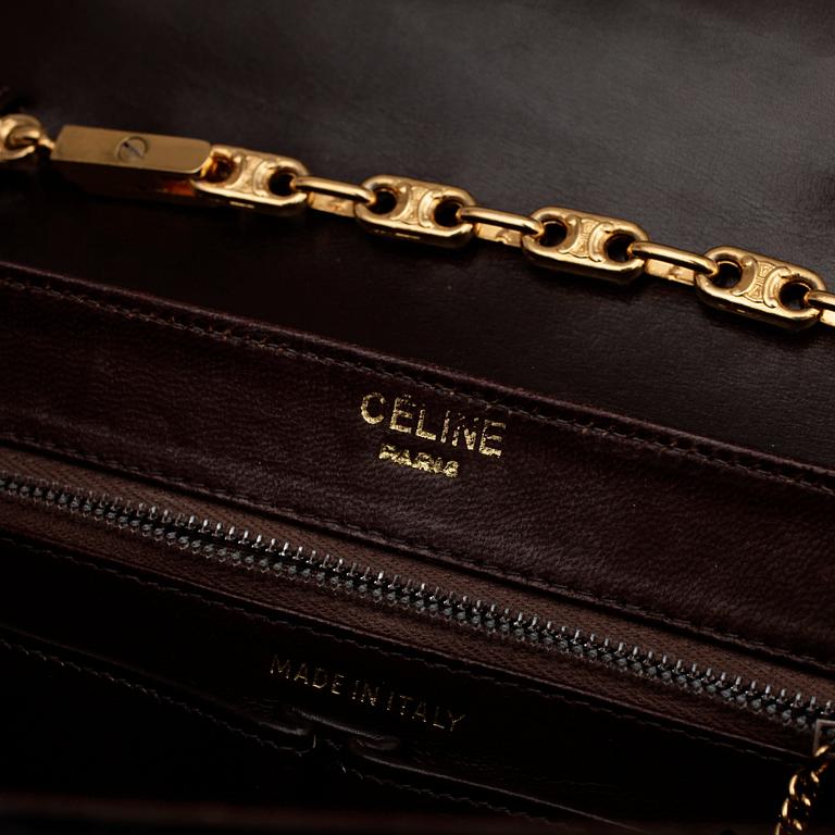 CÉLINE, a brown crocodile evening bag / shoulder bag with  shoulder strap.