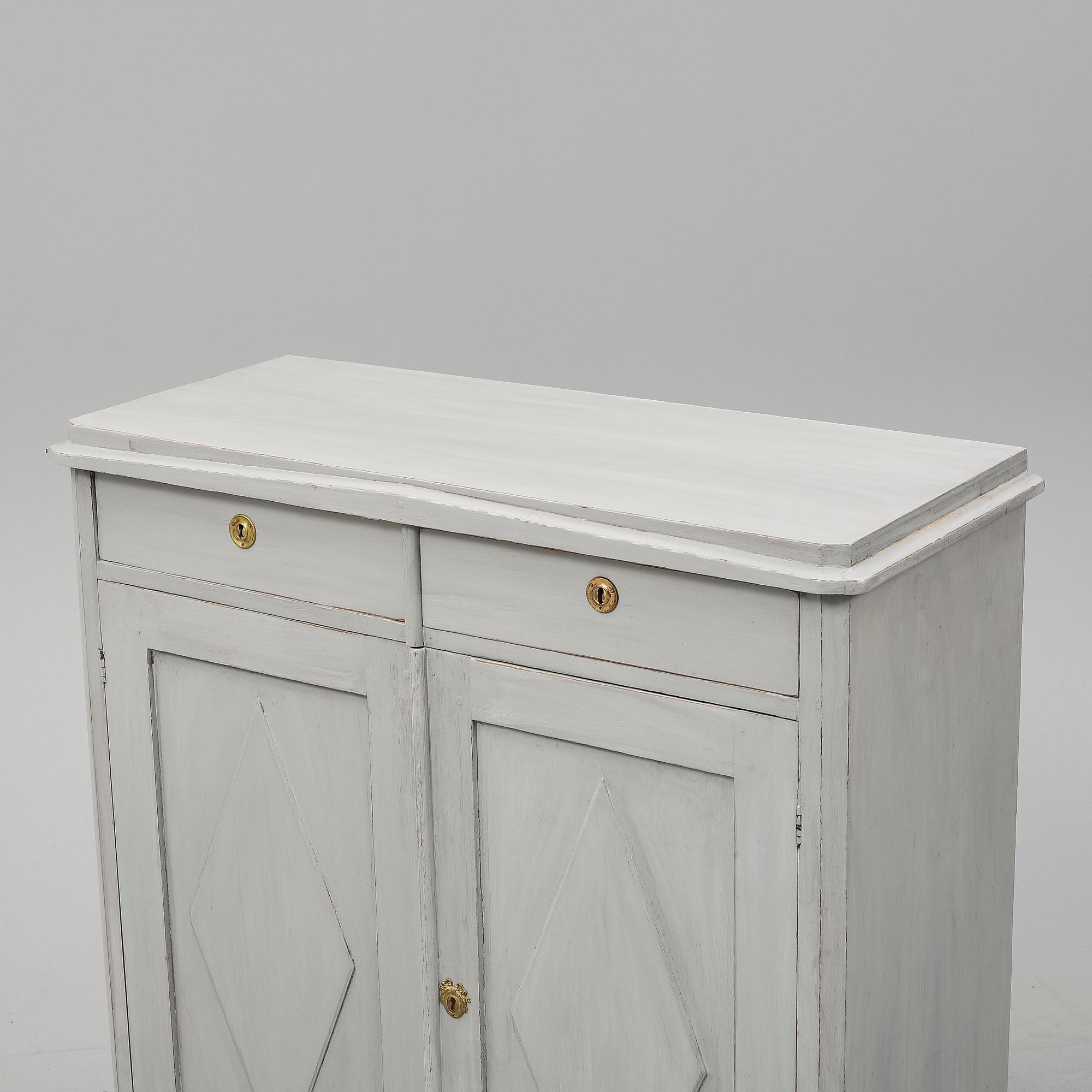 A mid 19th Century painted cupboard.