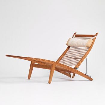 Hans J. Wegner, an oak lounge chair model "JH 524", Johannes Hansen, Copenhagen.