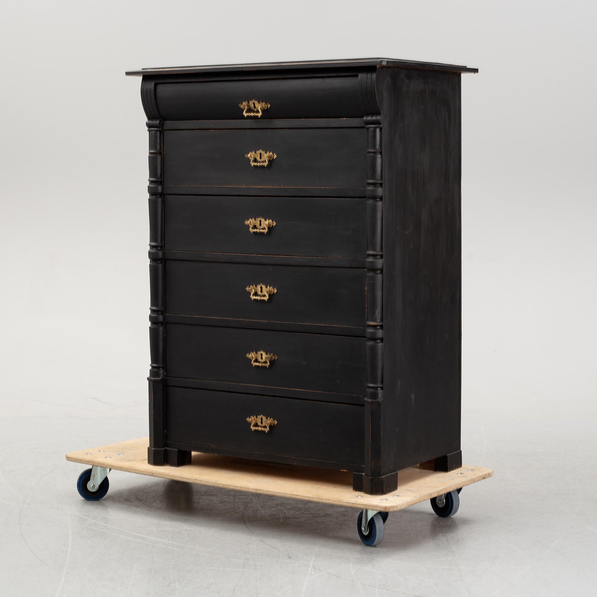 A painted chest of drawers, circa 1900.