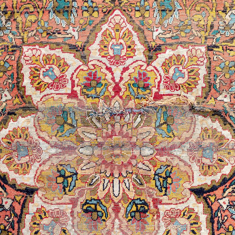 An antique Turkish /Hereke) signed carpet ca 200x121 cm.