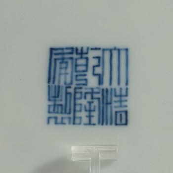 A pair of blue and white lotus dishes, Qing dynasty (1644-1912) with Qianlong seal mark.