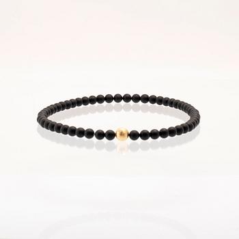 Ole Lynggaard, two necklaces and clasp in 18K gold.