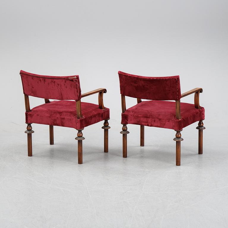 A pair of Swedish Grace 1920's armchairs.