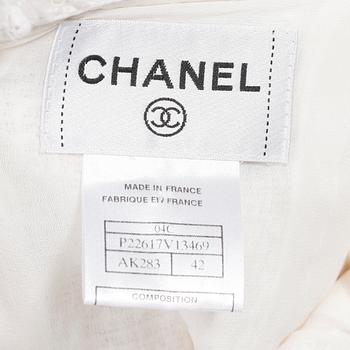 CHANEL, a white bouclé dress, 2004.