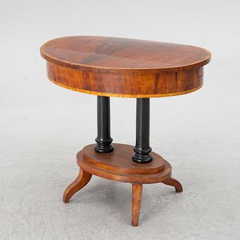 An Empire sewing table, mid-19th Century.