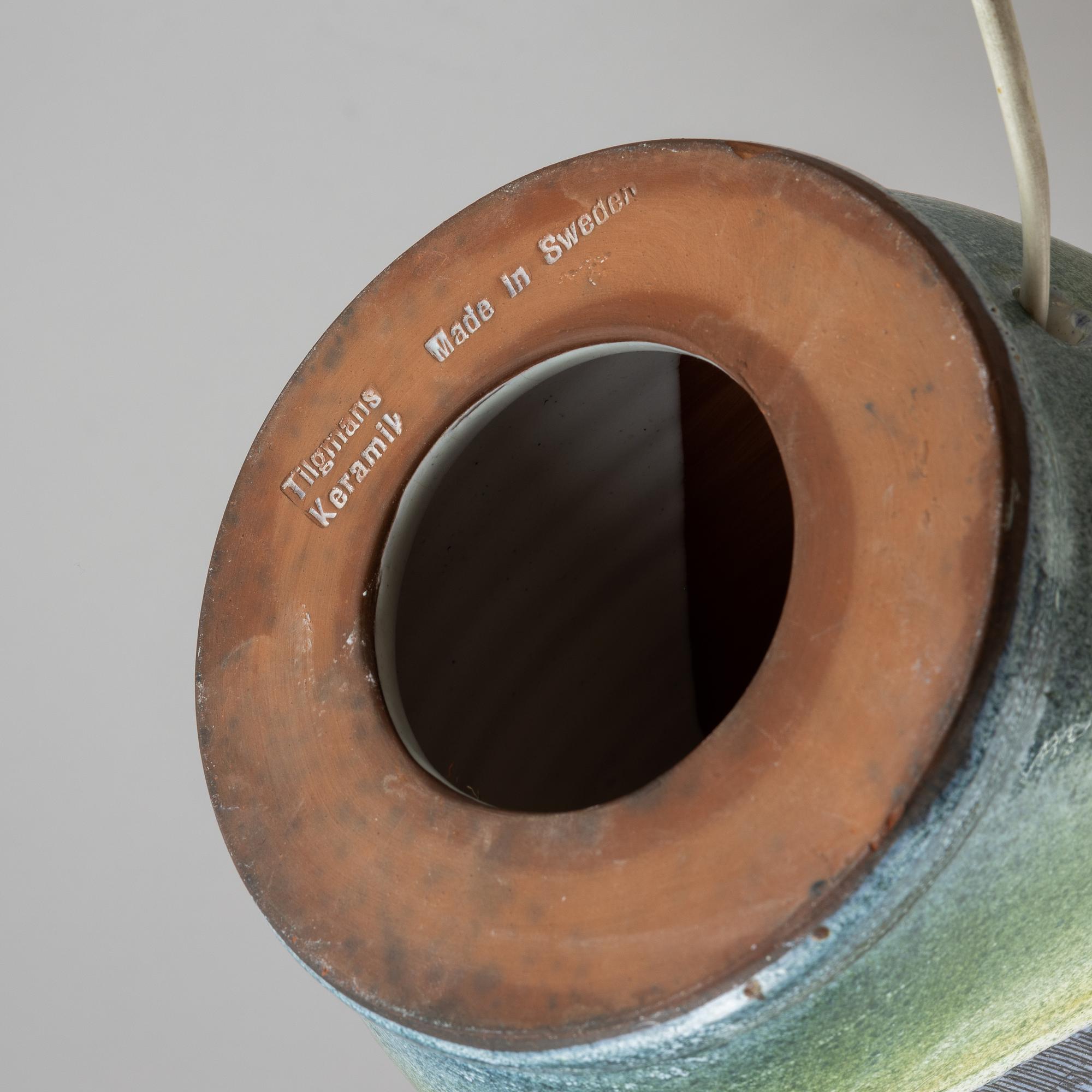 A 1950's/60's 'Fiskar' earthernware table lamp from Tilgmans.