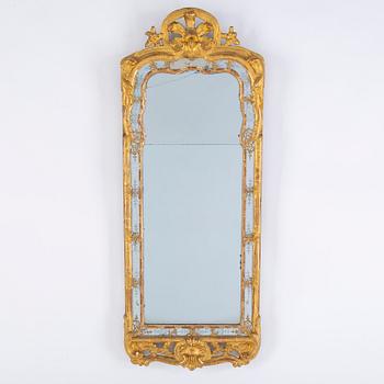 An 18th century rococo mirror.