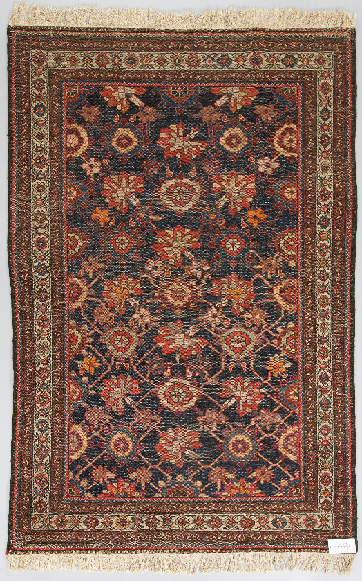 A Hamadan rug of 'Mina Khani design'. Circa 197 x 131 cm.