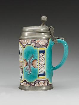 A German faience pewter-mounted tankard, 18th Century.