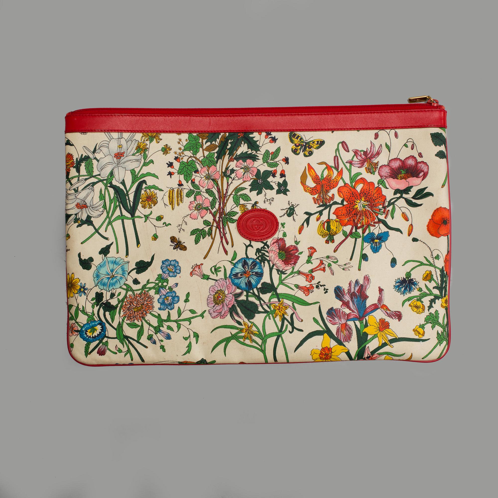 GUCCI, a 'Flora' garment bag.
