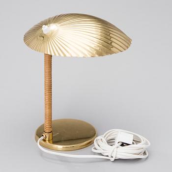 PAAVO TYNELL, A DESK LAMP. Shell. Manufactured by Taito Oy. Designed in 1938/39.