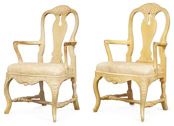957. Two matched Swedish Rococo armchairs, one signed by J. Lindgren.