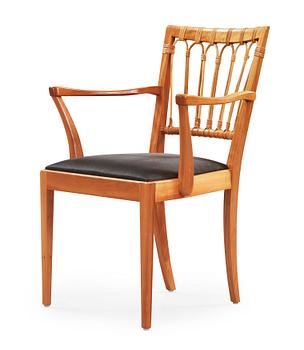 A Josef Frank mahogany and rattan armchair, Svenskt Tenn, model 1165.