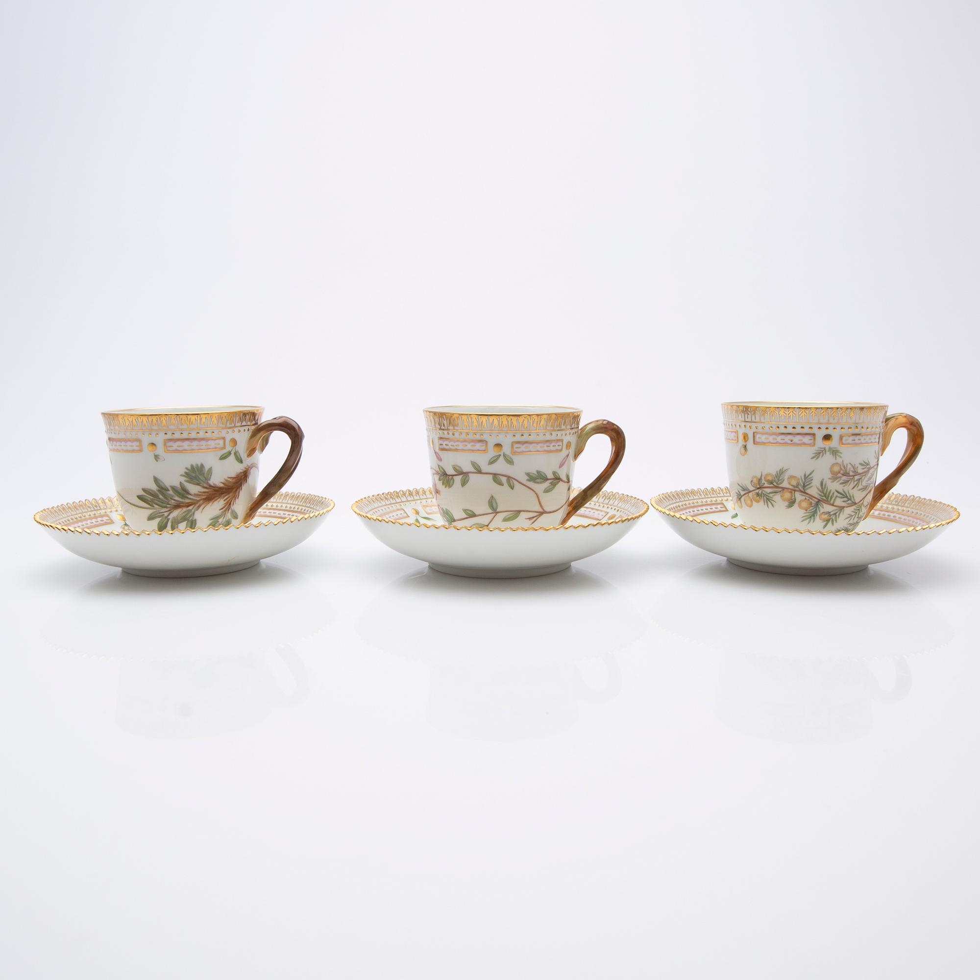Royal Copenhagen, Coffee cups with saucers, three pieces, porcelain, 'Flora Danica', Royal Copenhagen, Denmark, 20th century.