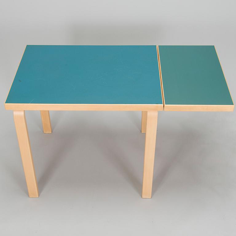 Alvar Aalto, A mid-20th century drop leaf table and three chairs for O.Y. Huonekalu-ja Rakennustyötehdas A.B.