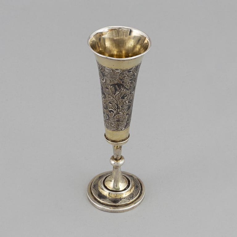 A Russian silver gilt and niello champagne flute, unidentified makers mark, Moscow 1843.