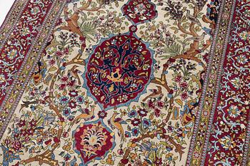 An antique Isfahan rug, Central Persia, c. 219 x 143 cm.