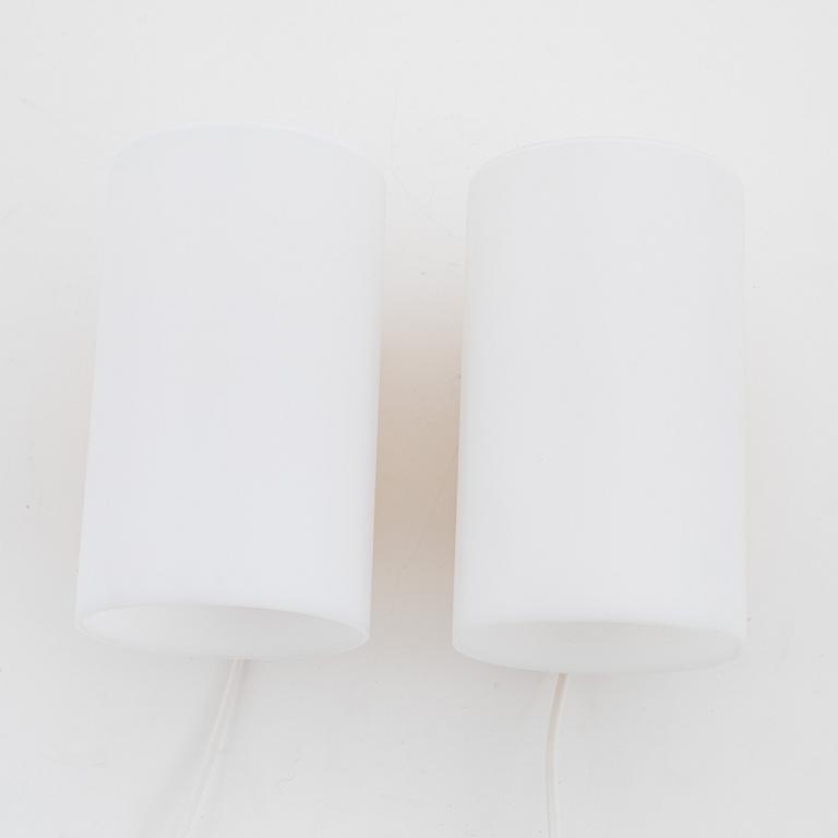 A pair of pine and acrylic wall lights, Luxus, Vittsjö.