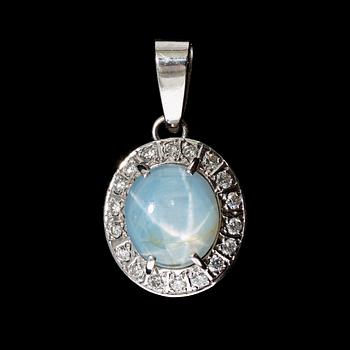 174. A light blue star-sapphire pendant with brilliant cut diamonds. Total carat weight of diamonds circa 0.36 ct.