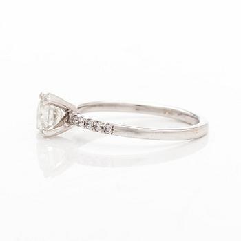 A 14K white gold ring with brilliant-cut diamonds.