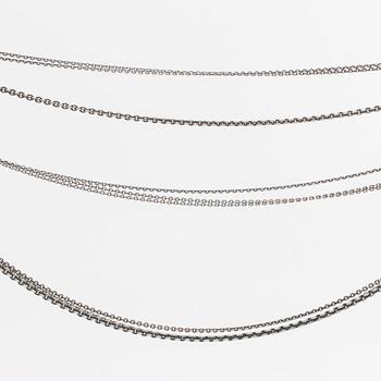 LYNGGAARD 2 3-row necklaces in silver and 1 textile w silver details.