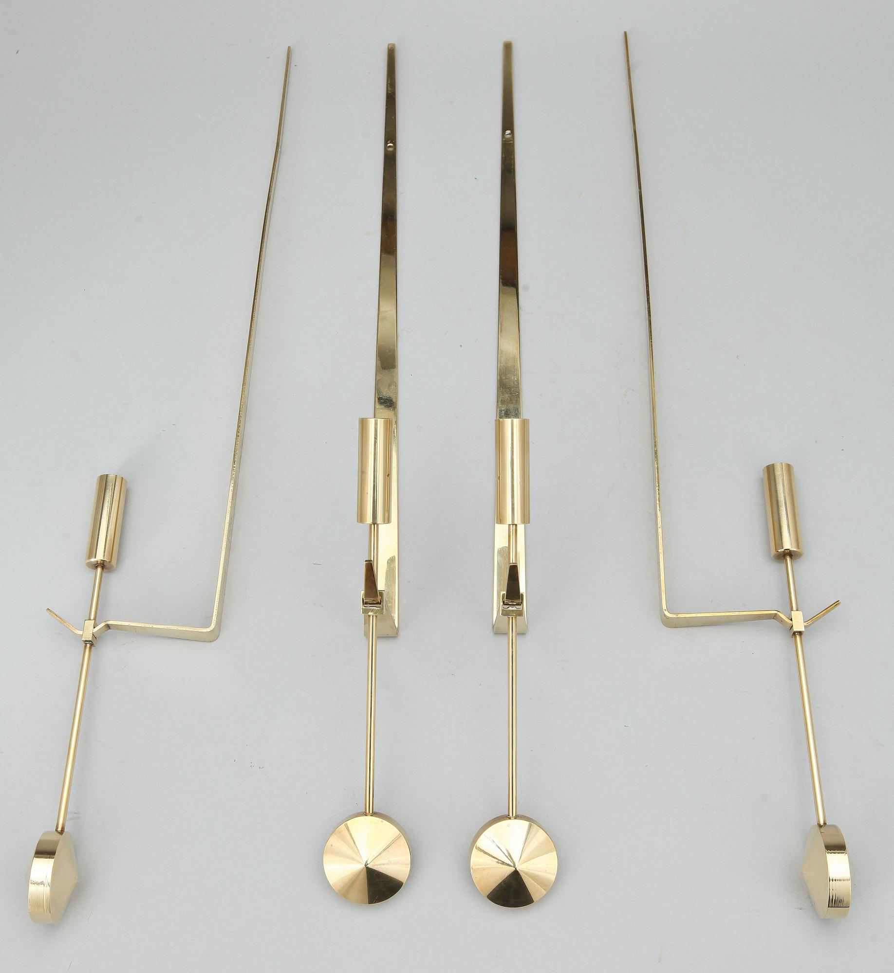 VÄGGLJUSSTAKAR, 4 st. Mässing. "Pendel", Pierre Forsell, Skultuna, Sverige, 1900-talets andra hälft.