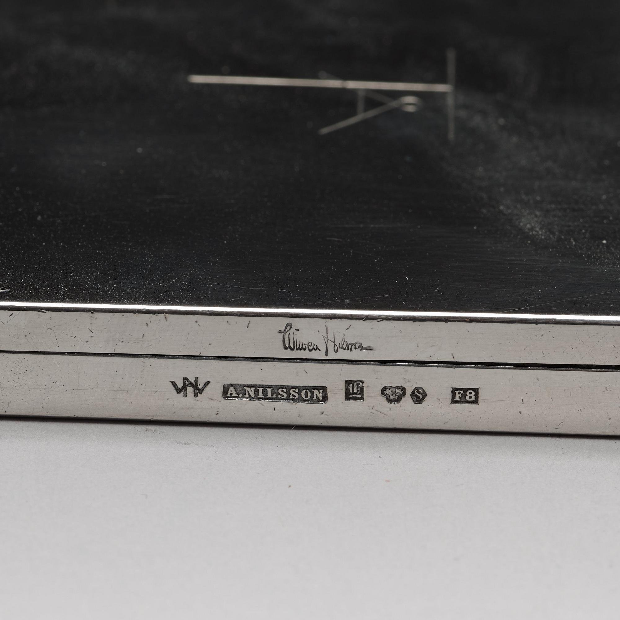 Wiwen Nilsson, a silver set with a pair of candlesticks and a cigarette case, Lund Sweden 1927-38.