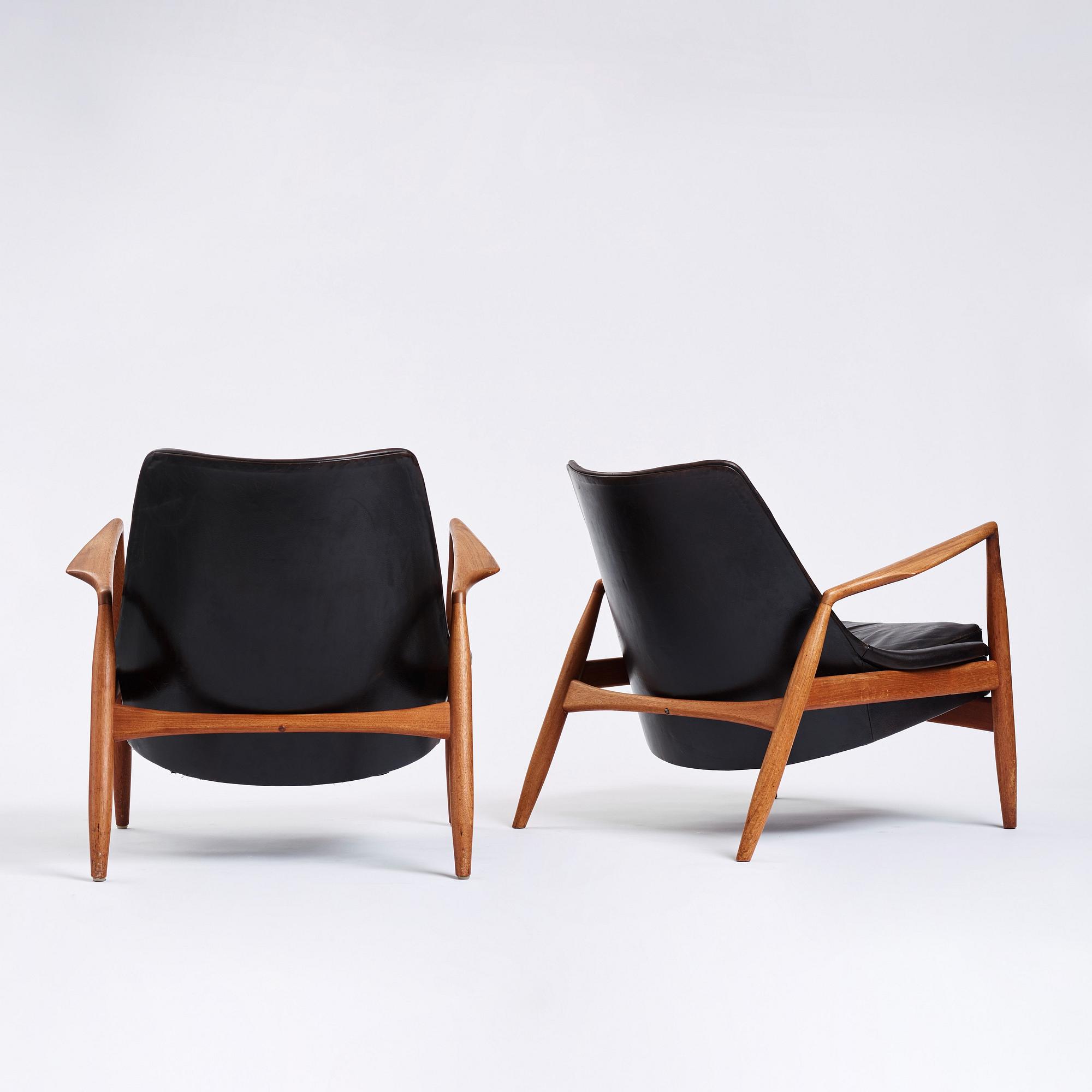 Ib Kofod-Larsen, a pair of black leather 'Sälen' easy chairs, Olof Perssons Fåtöljindustri (OPE), Sweden 1950s-60s.
