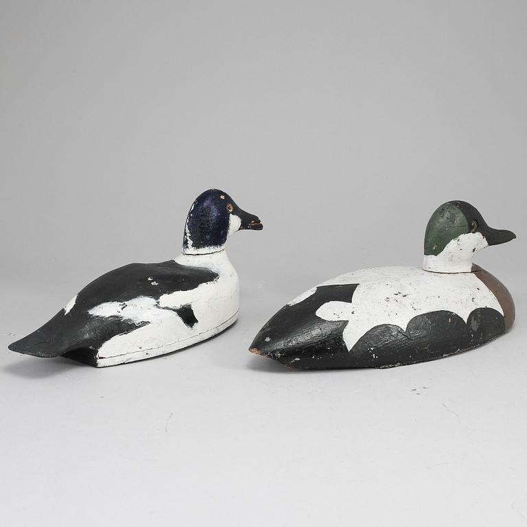 Two painted wood imitation duck,  first half of the 20th century.