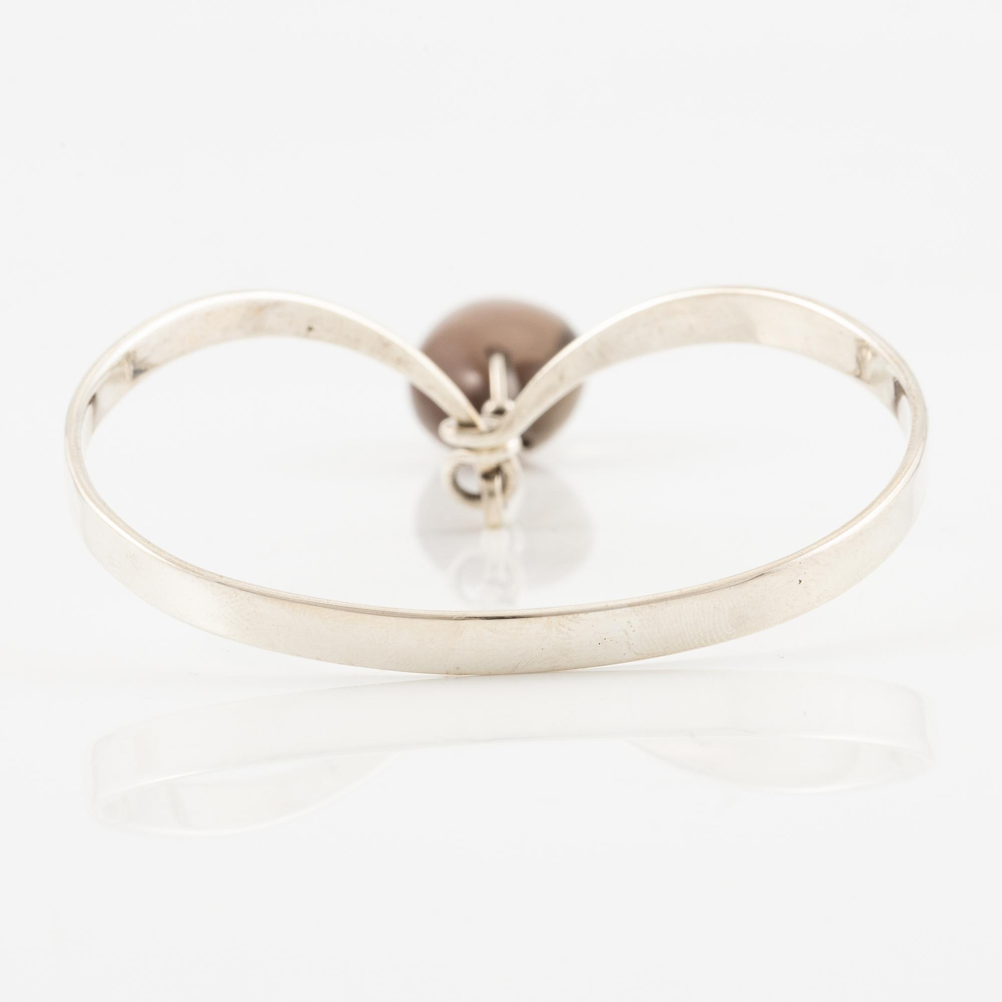 Vivianna Torun Bülow-Hübe, a bracelet with pendant, sterling silver and smoky quartz, for Georg Jensen.