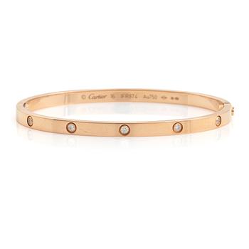 544. Cartier "Love" liten modell armband 18K roséguld med tio runda briljantslipade diamanter.