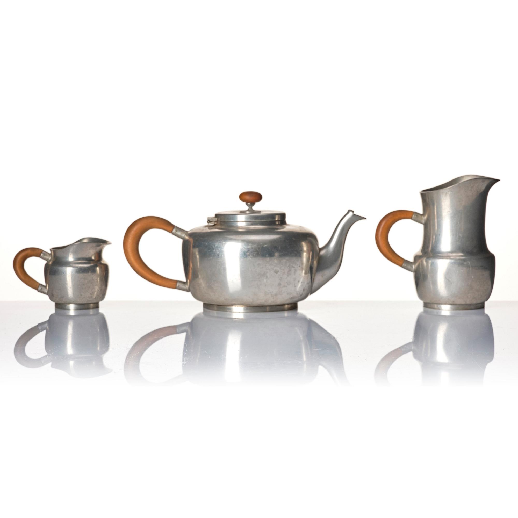 Josef Frank, a four pieces pewter tea service and a tray, model "A2330", Svenskt Tenn, Stockholm 1946 (tray 1929).