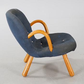 A chair attributed to Philip Arctander, model "Clam Chair" or "Muslinge", 1940s/50s.
