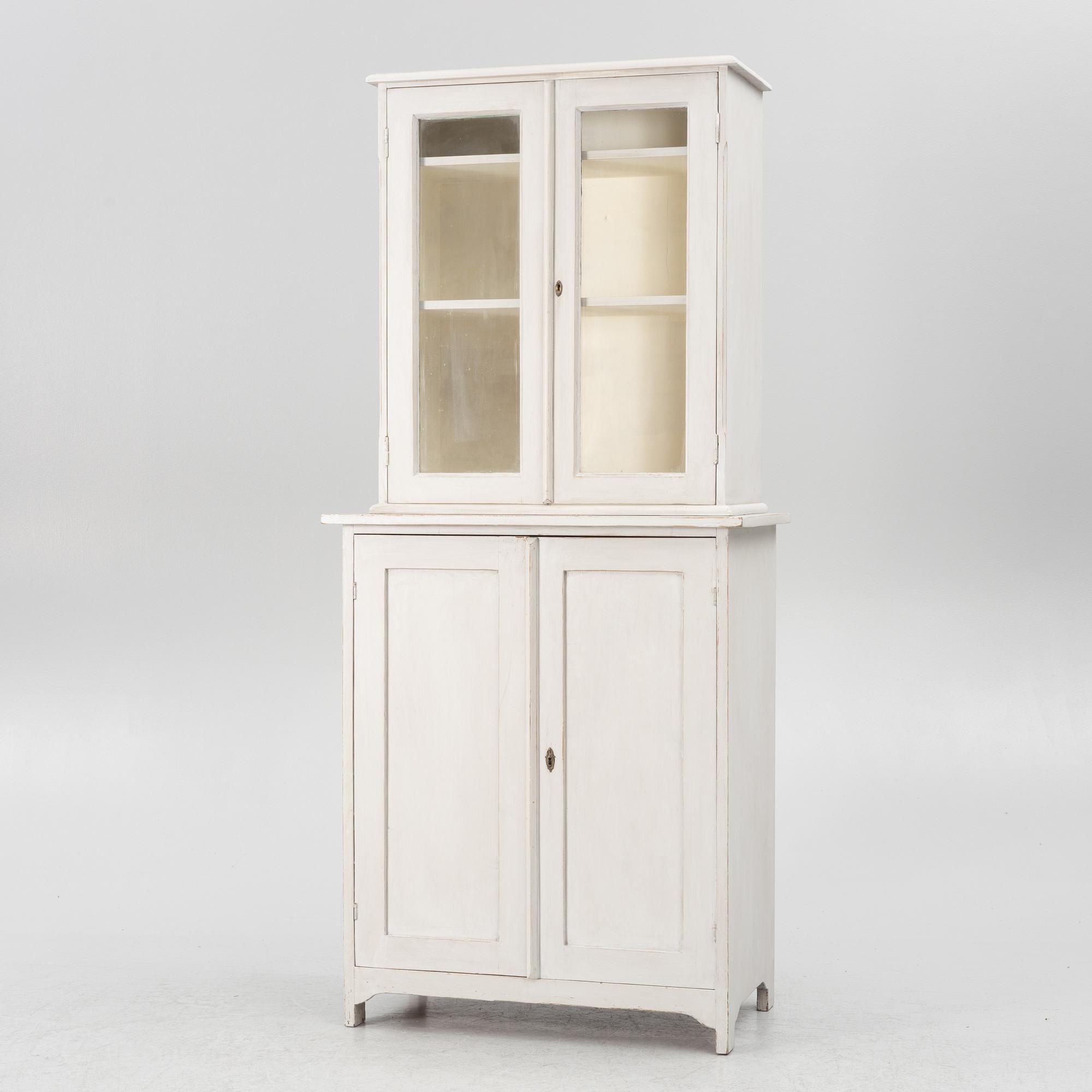 A vitrine cabinet, early 20th century.