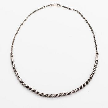 A sterling silver necklace "Twined jewellery from Lampola in Halikko". Kalevala koru, Helsinki 1992.