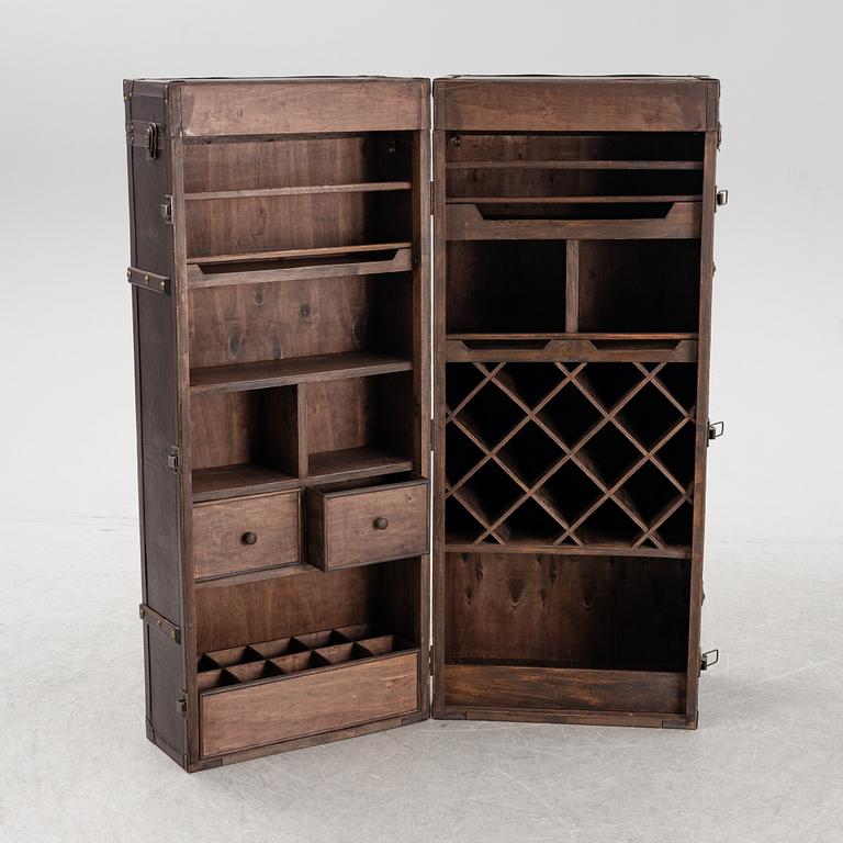 A leather suitcase-shaped bar cabinet.